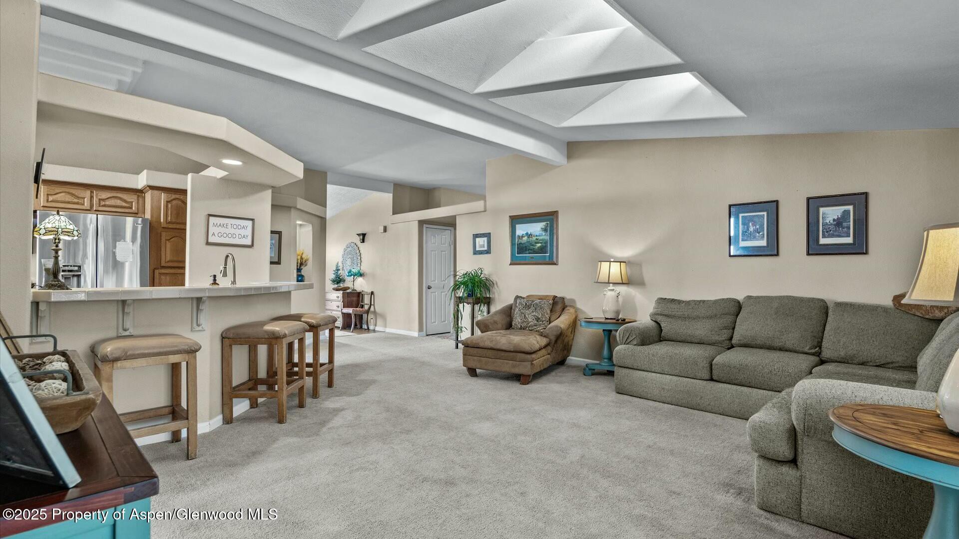 10479 50 Road Mesa, CO 81643 - Photo 7 of 42 a living room with furniture and a dining table