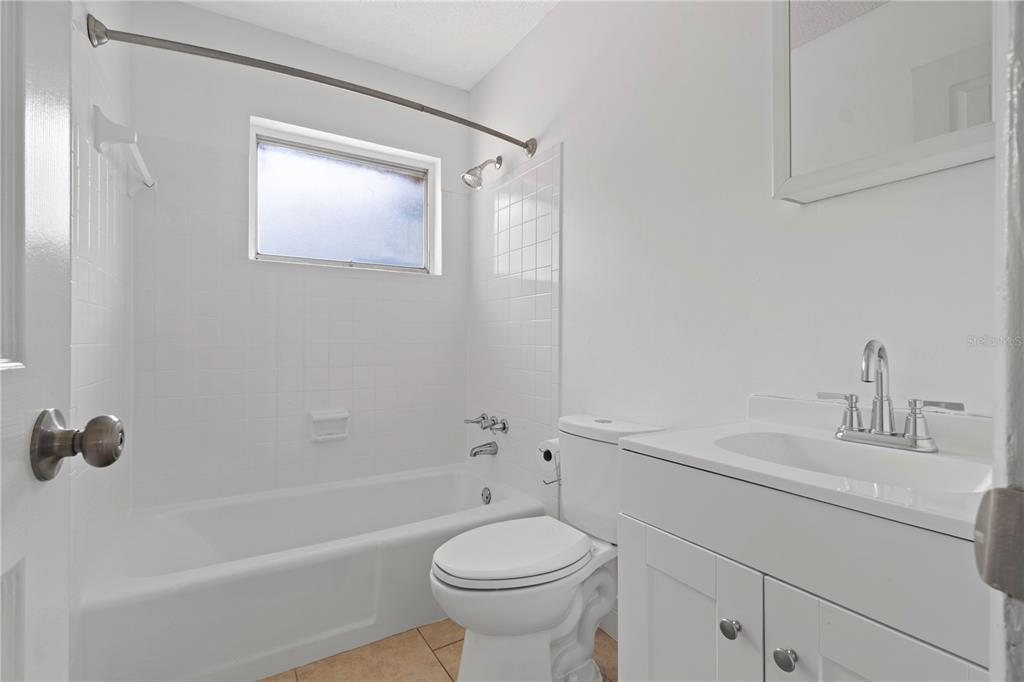 24 Bahia Loop Ocala, FL 34472 - Photo 6 of 9 a bathroom with a sink a toilet and shower