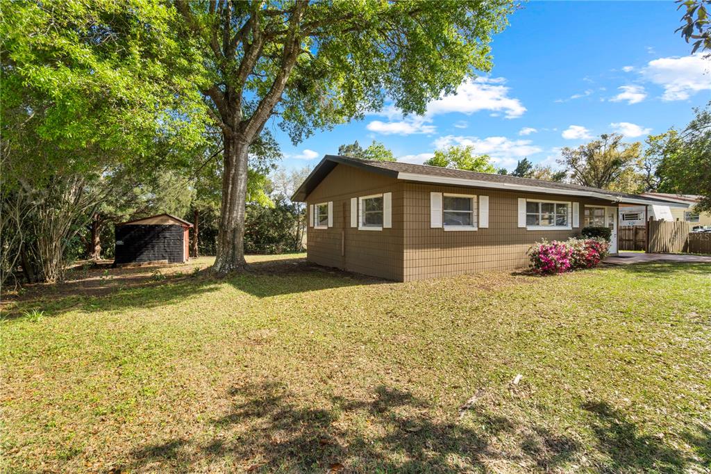 24 Bahia Loop Ocala, FL 34472 - Photo 7 of 9 a front view of house with yard and green space