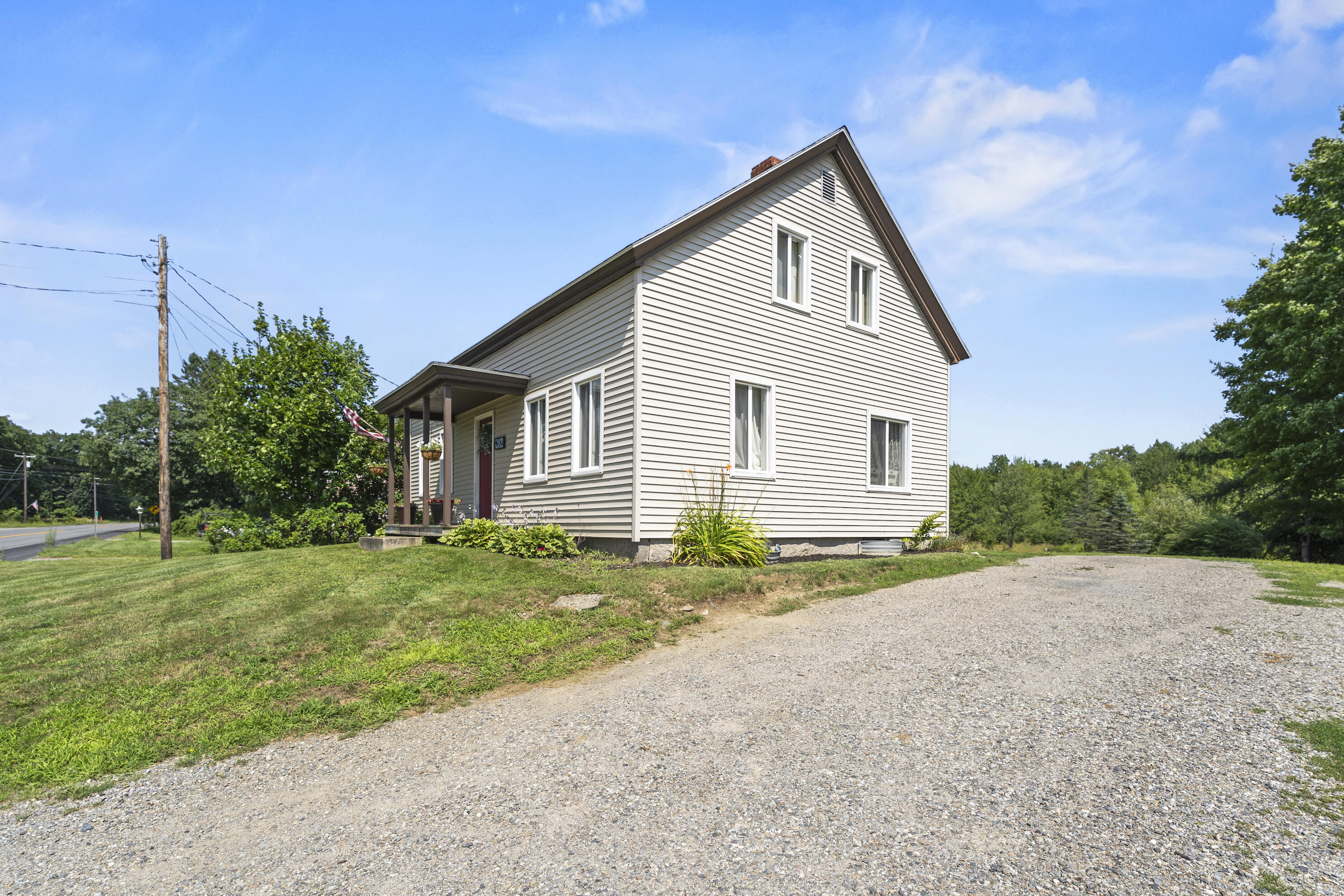 584 River Road Orrington, ME 04474 - Photo 3 of 40 584 River Rd. side