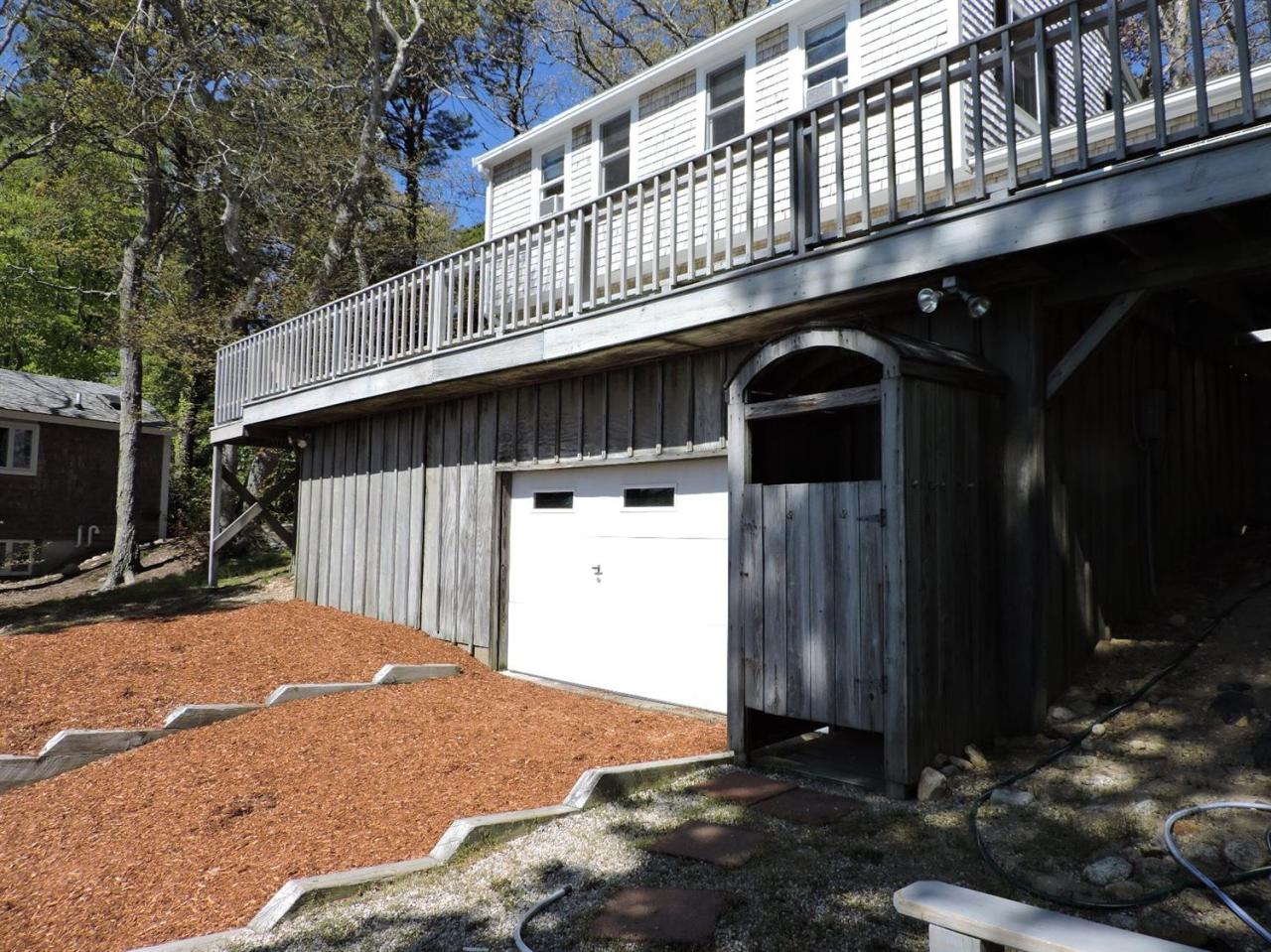 85 Huckins Neck Road Centerville, MA 02632 - Photo 20 of 23 a view of a small house