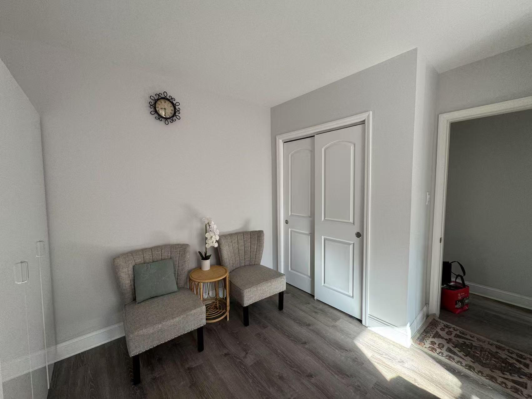 141-13 78th Road, Unit 2M Queens, NY 11367 - Photo 3 of 22 a living room with furniture and wooden floor