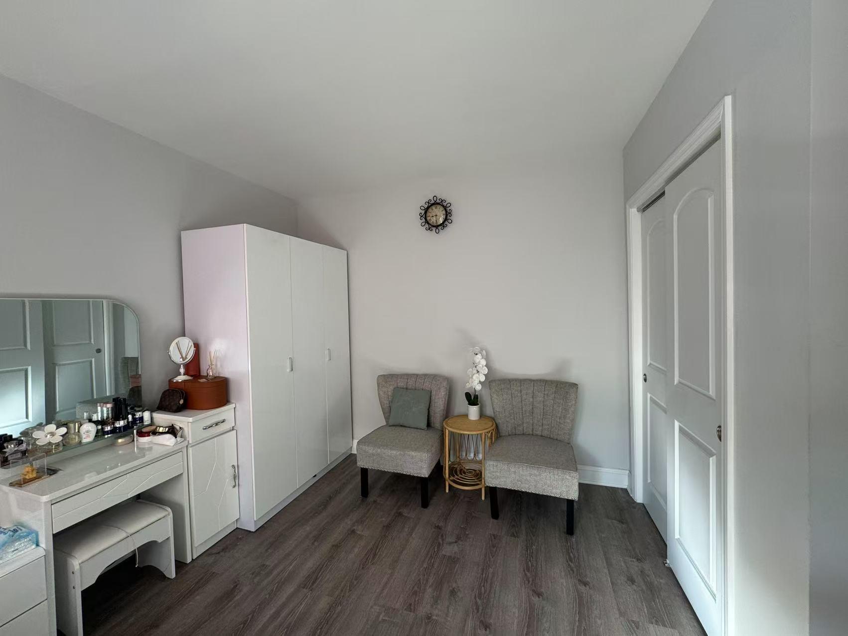 141-13 78th Road, Unit 2M Queens, NY 11367 - Photo 5 of 22 a bathroom with a sink mirror and toilet