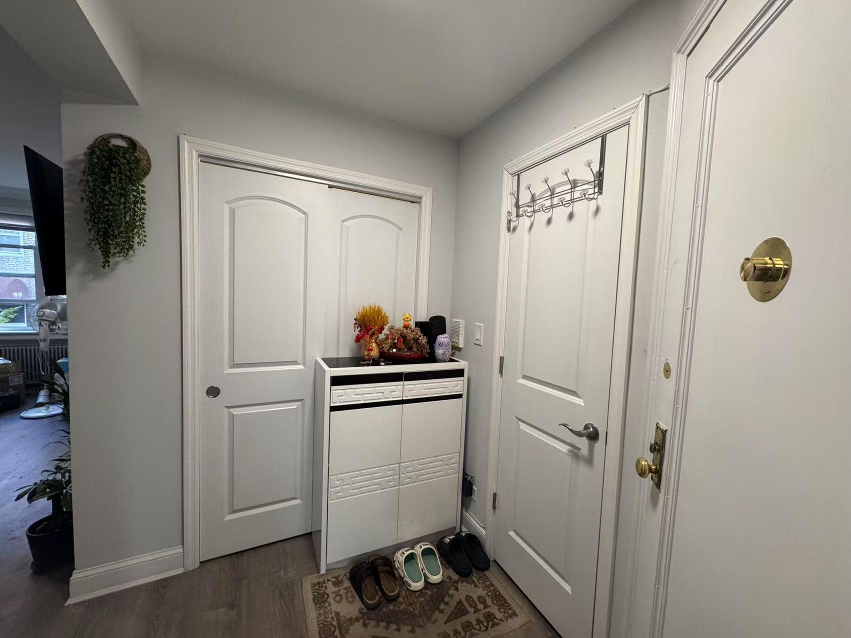 141-13 78th Road, Unit 2M Queens, NY 11367 - Photo 6 of 22 a room with storage and utility