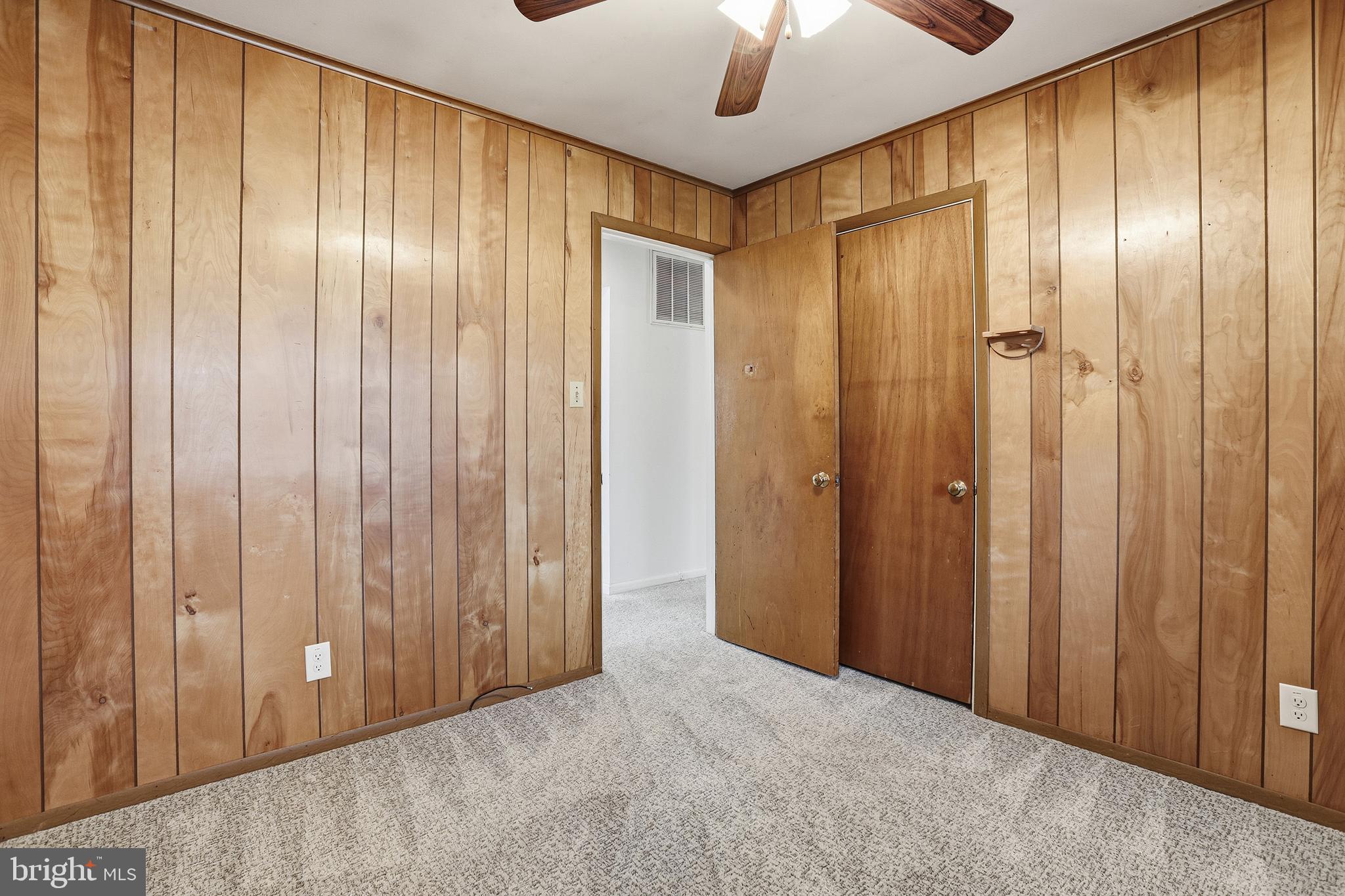 204 Musselman Road Fredericksburg, VA 22405 - Photo 19 of 32 a view of an empty room with a chandelier fan
