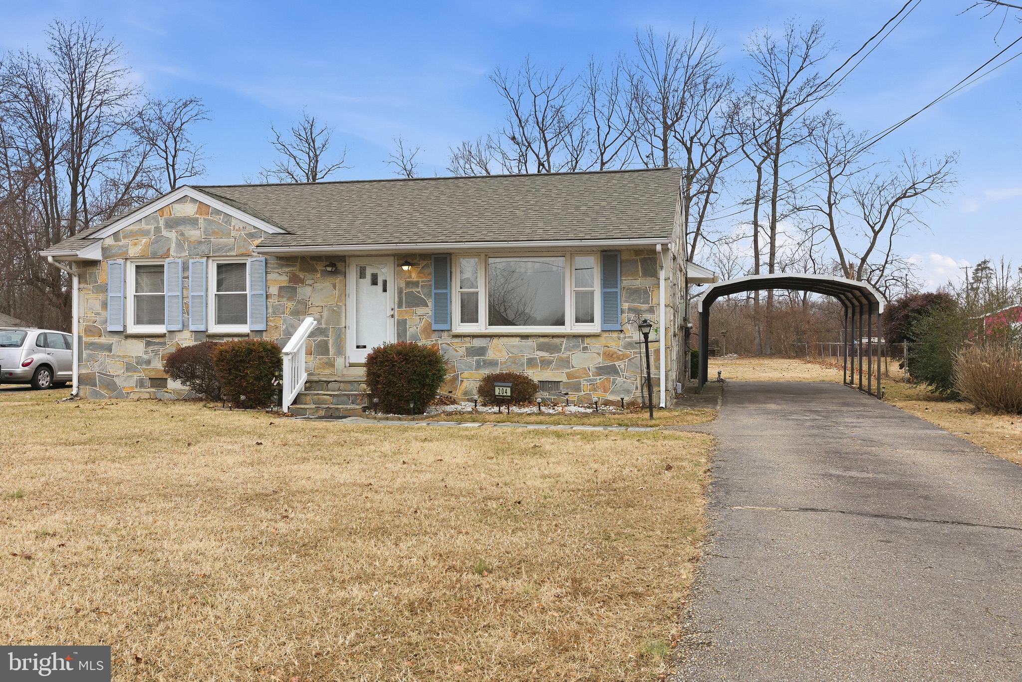 204 Musselman Road Fredericksburg, VA 22405 - Photo 2 of 32 a front view of a house with a yard