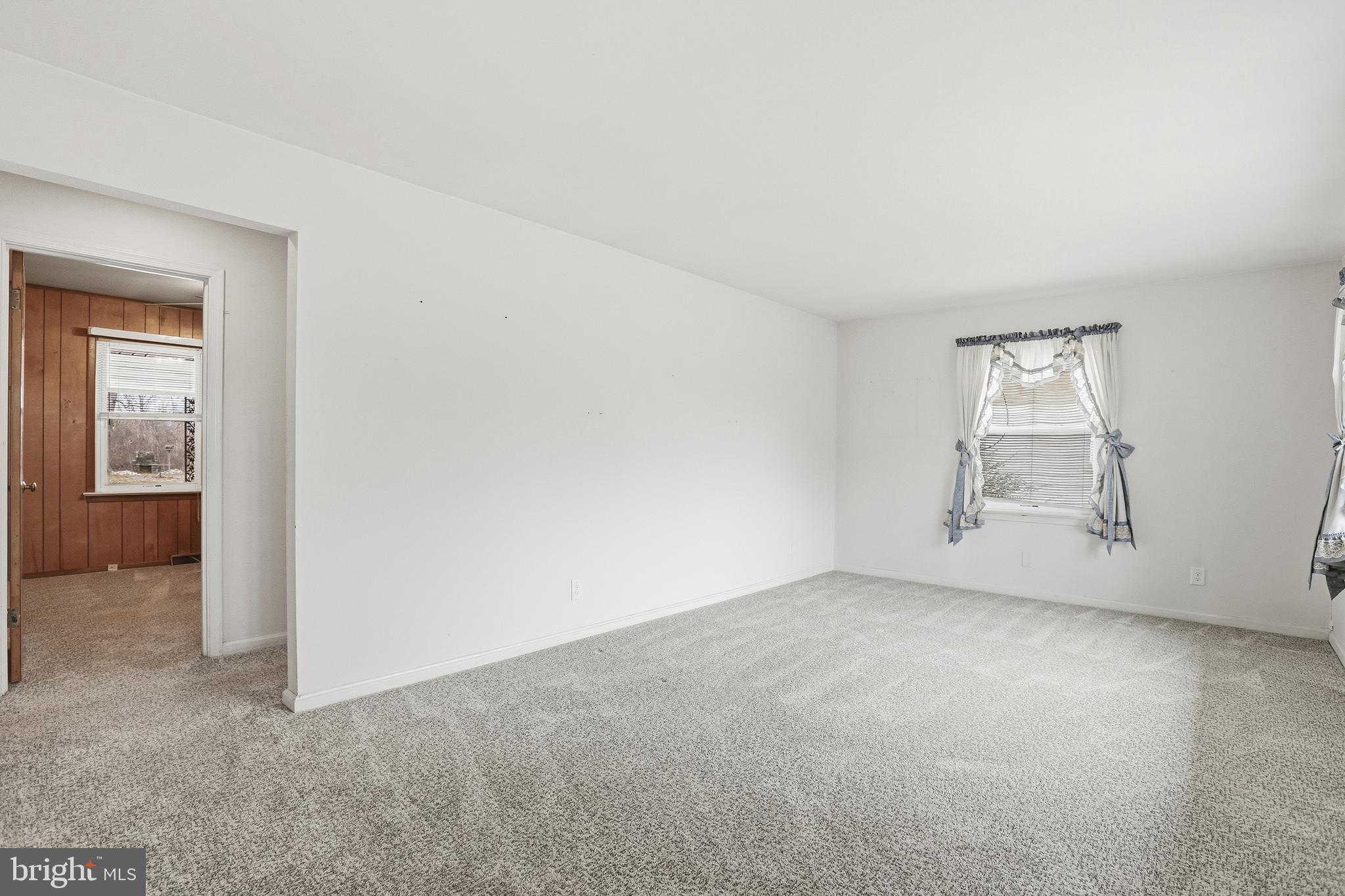 204 Musselman Road Fredericksburg, VA 22405 - Photo 6 of 32 an empty room with windows