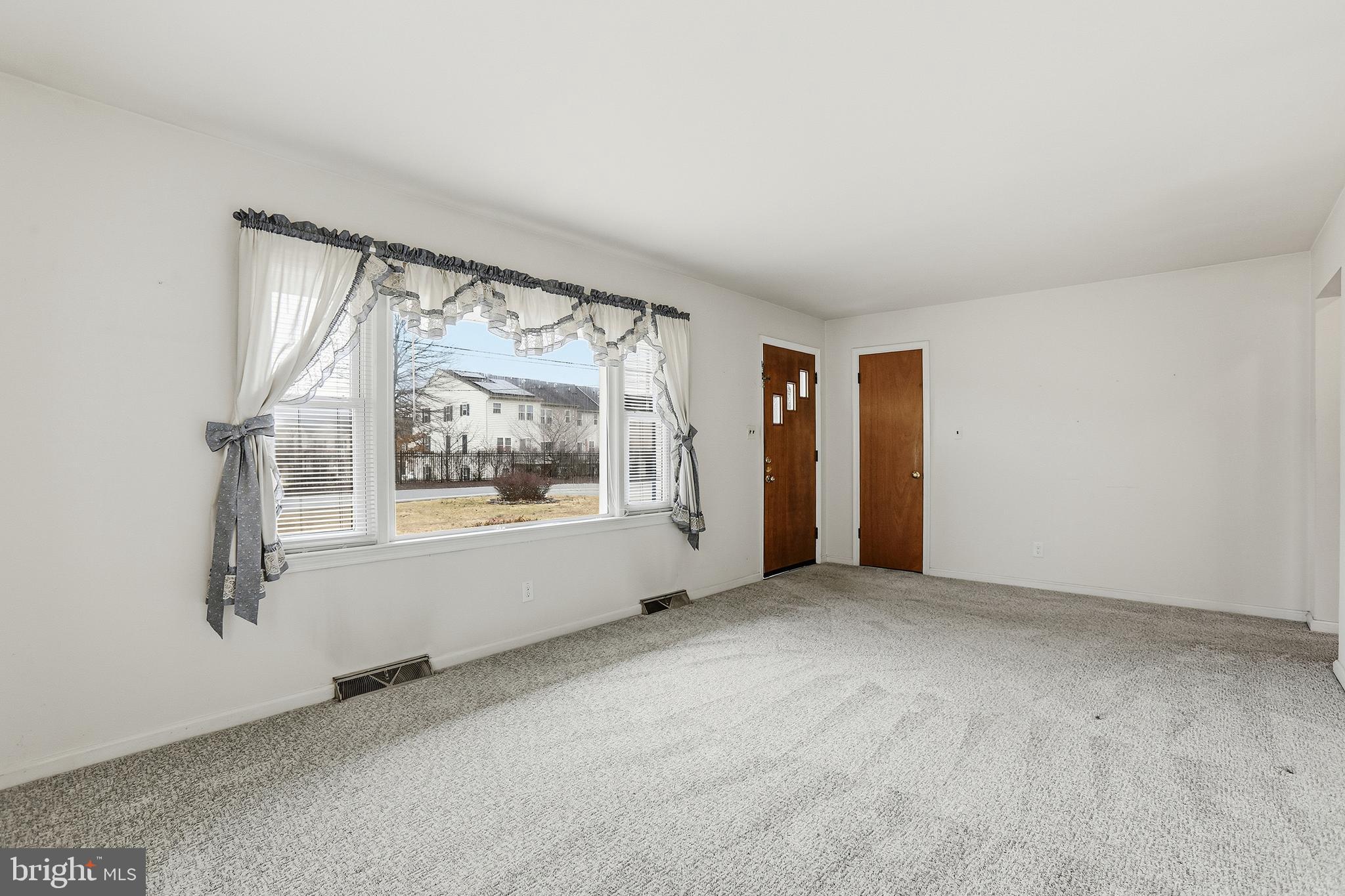 204 Musselman Road Fredericksburg, VA 22405 - Photo 7 of 32 an empty room with windows