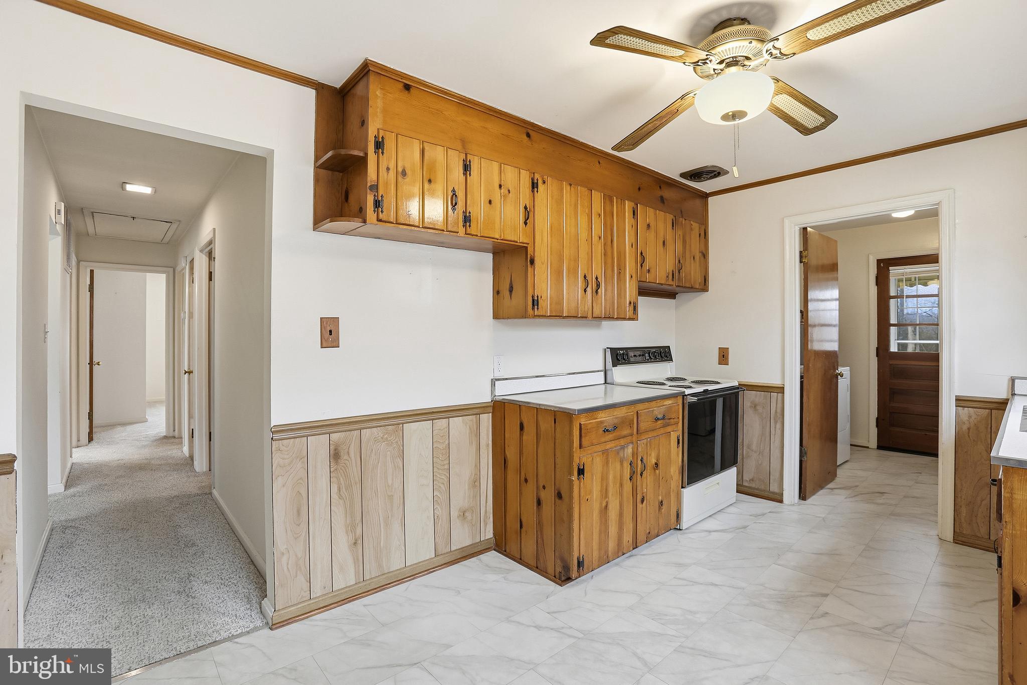 204 Musselman Road Fredericksburg, VA 22405 - Photo 10 of 32 a kitchen with granite countertop a refrigerator a sink and dishwasher
