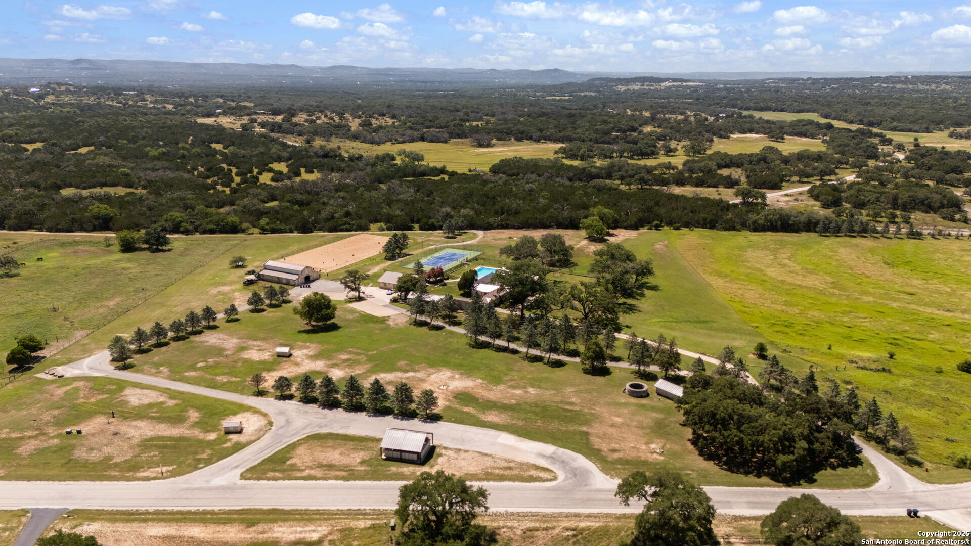 1005 Buckskin Trail Bandera, TX 78003 - Photo 18 of 27 an aerial view of residential houses with outdoor space