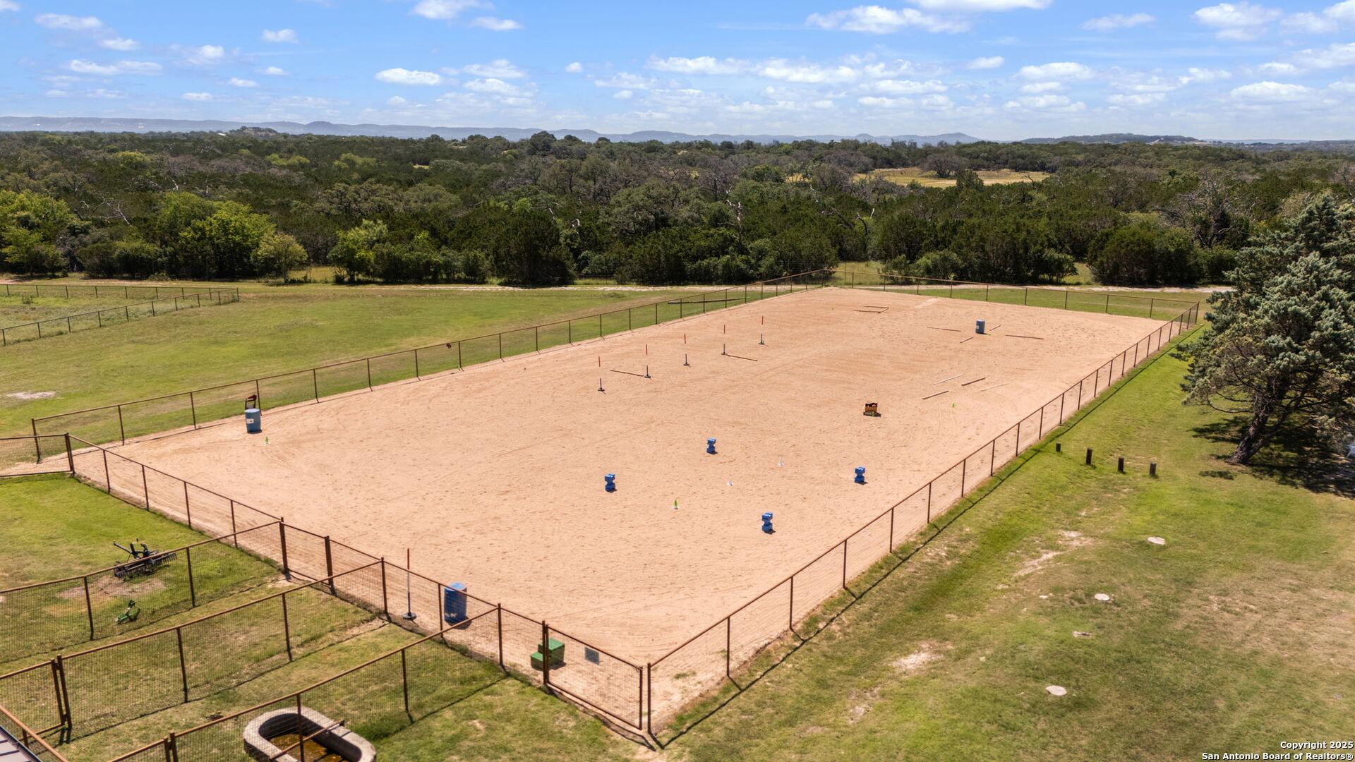 1005 Buckskin Trail Bandera, TX 78003 - Photo 4 of 27 a view of an outdoor space and a yard