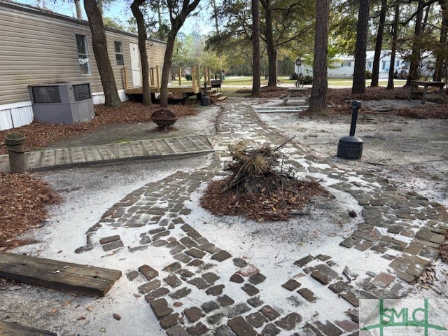 1494 Williamson Rd N East Townsend, GA 31331 - Photo 13 of 22 Brick walkway to firepit
