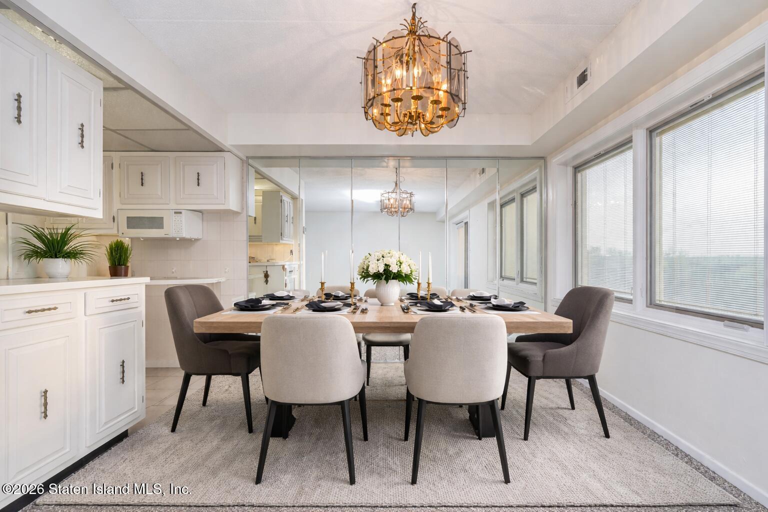 5 Windham Loop, Unit 4M Staten Island, NY 10314 - Photo 15 of 36 a view of a dining room with furniture window and outside view