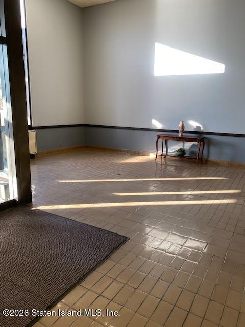 5 Windham Loop, Unit 4M Staten Island, NY 10314 - Photo 4 of 36 a view of a room with gym equipment