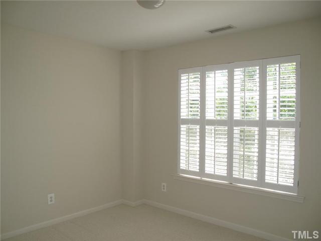1100 Garnet Ridge Way Raleigh, NC 27607 - Photo 11 of 14 a room that has a window in it