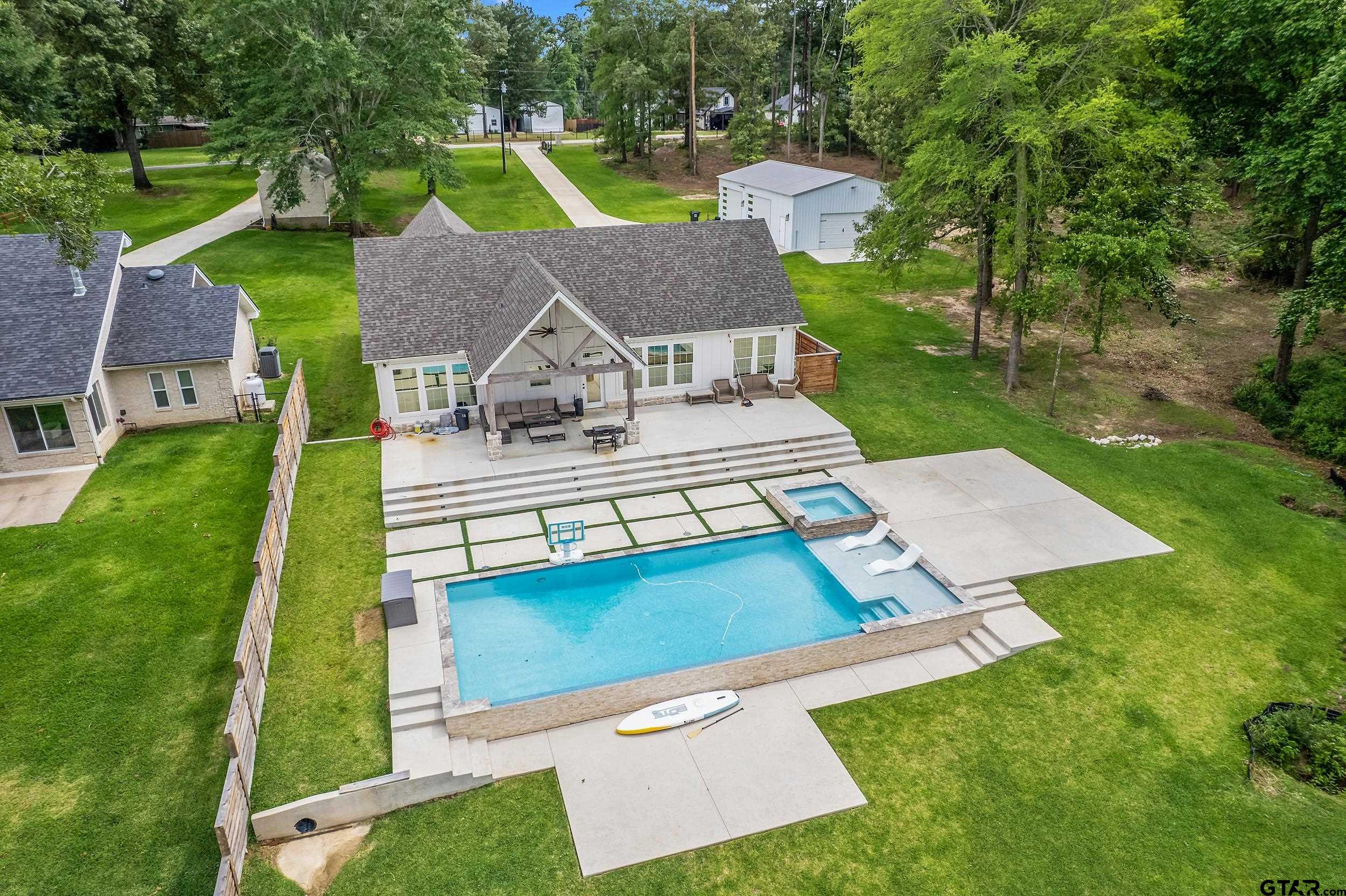 16837 Wilson Road Tyler, TX 75707 - Photo 40 of 44 an aerial view of a house with swimming pool garden and patio