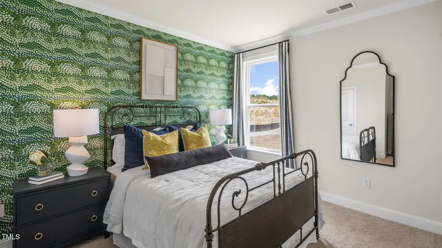 a bedroom with furniture and windows