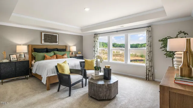 a bed room with furniture and a window