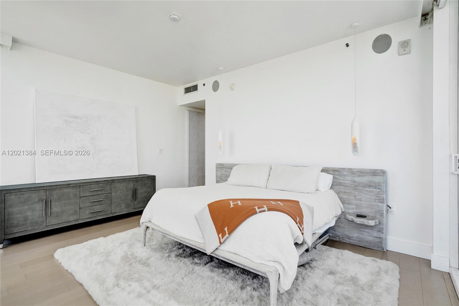 400 Alton Road, Unit PH11 Miami Beach, FL 33139 - Photo 27 of 49 a bedroom with a bed and window