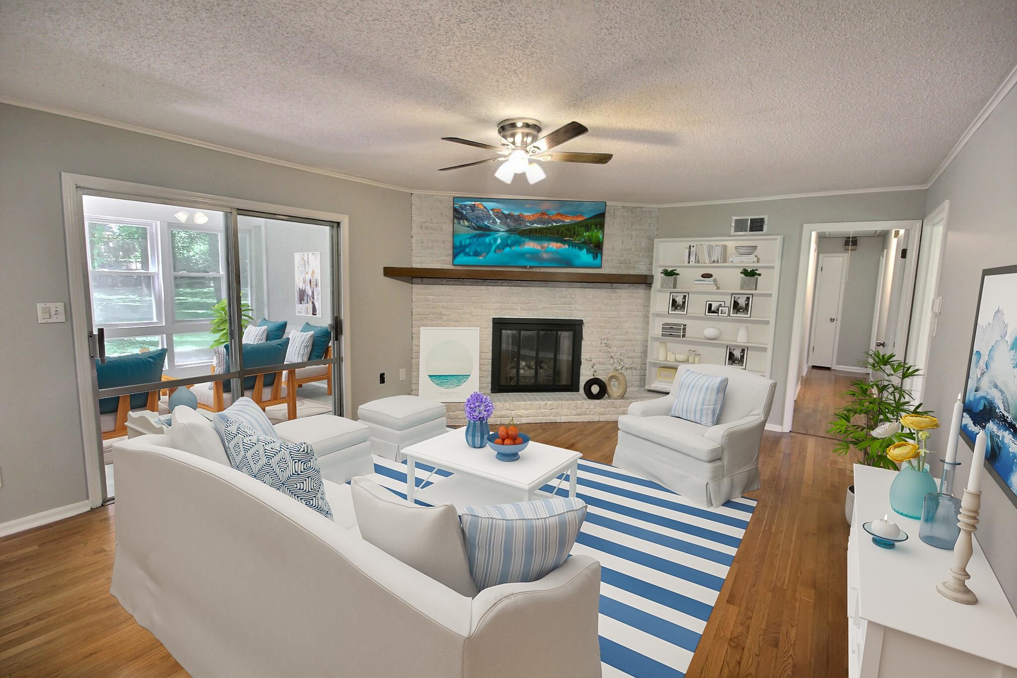 283 Andrew Way Road Collierville, TN 38017 - Photo 1 of 19 a living room with furniture fireplace and a large window