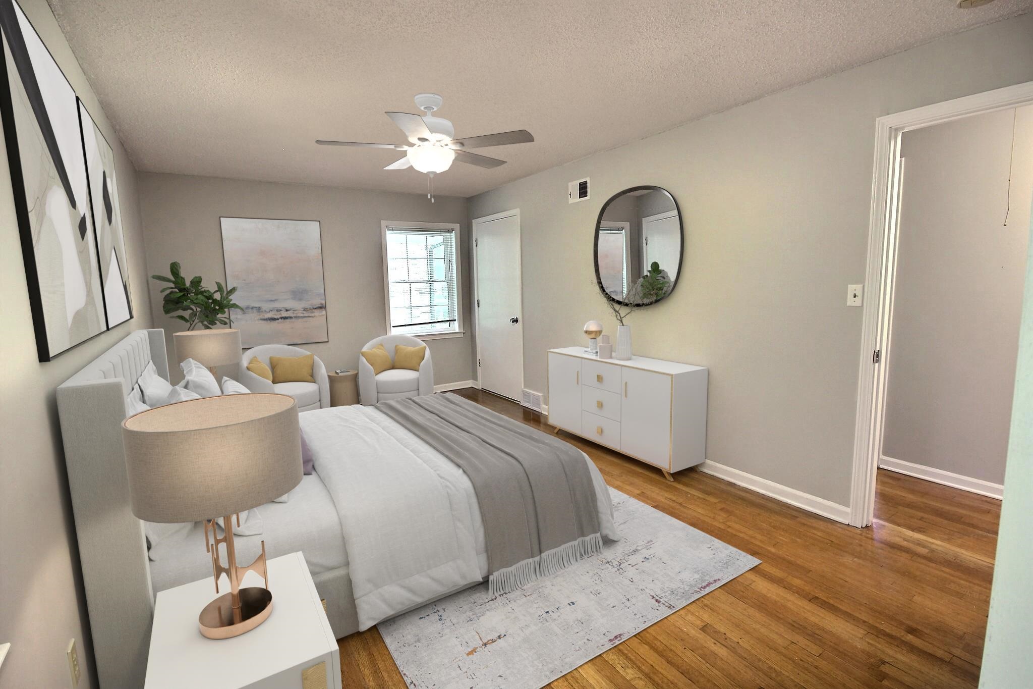 283 Andrew Way Road Collierville, TN 38017 - Photo 12 of 19 a bedroom with bed a chandelier and a window