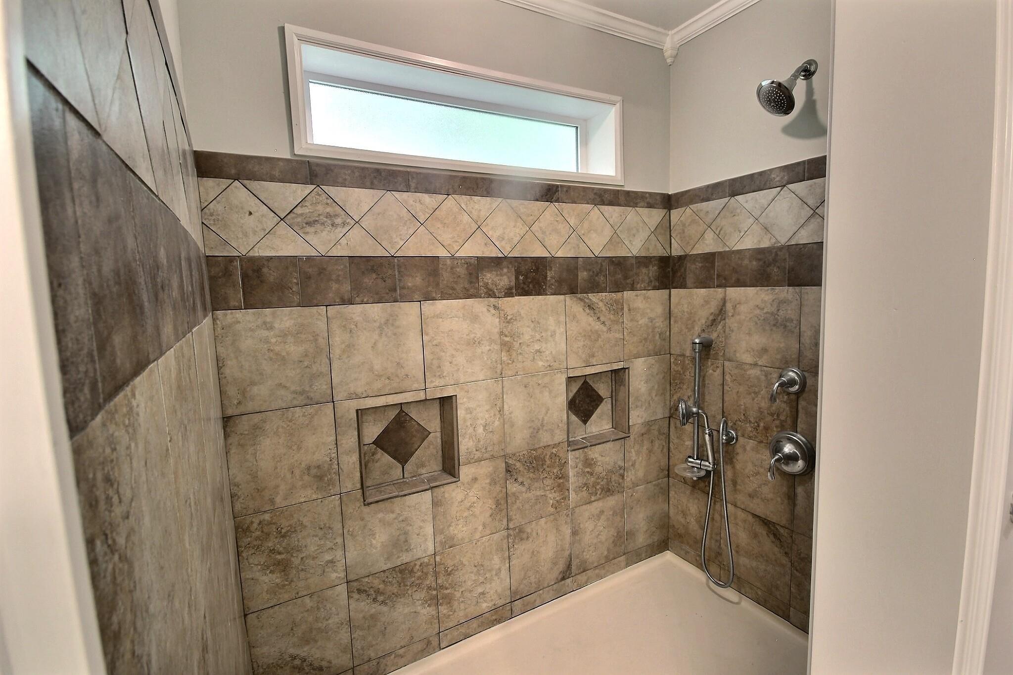 283 Andrew Way Road Collierville, TN 38017 - Photo 14 of 19 a bathroom with a shower