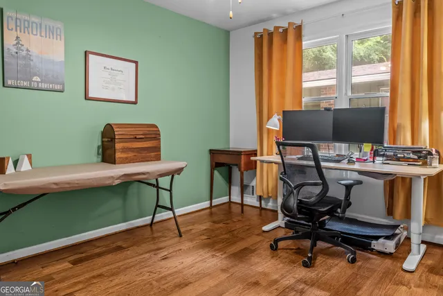 a en suite bathroom with a sink and a mirror