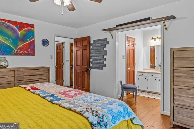 a bathroom with a sink a mirror and a window