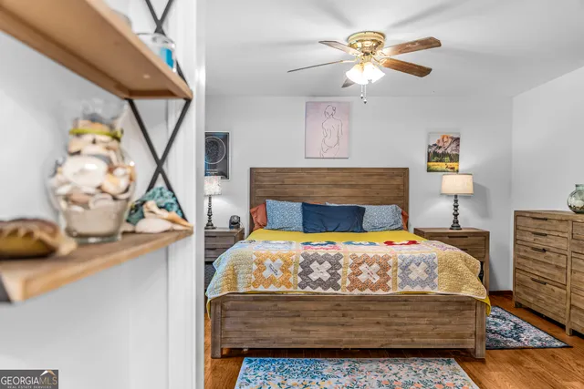 a living room with furniture a rug and a fireplace
