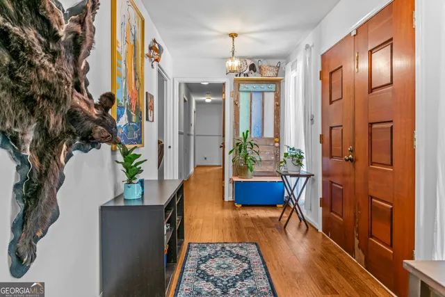 a kitchen with stainless steel appliances a refrigerator sink and cabinets