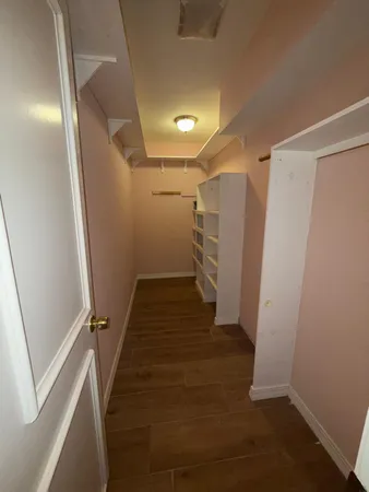 a view of small space with racks on the wall