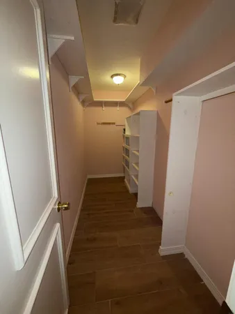 a view of small space with racks on the wall