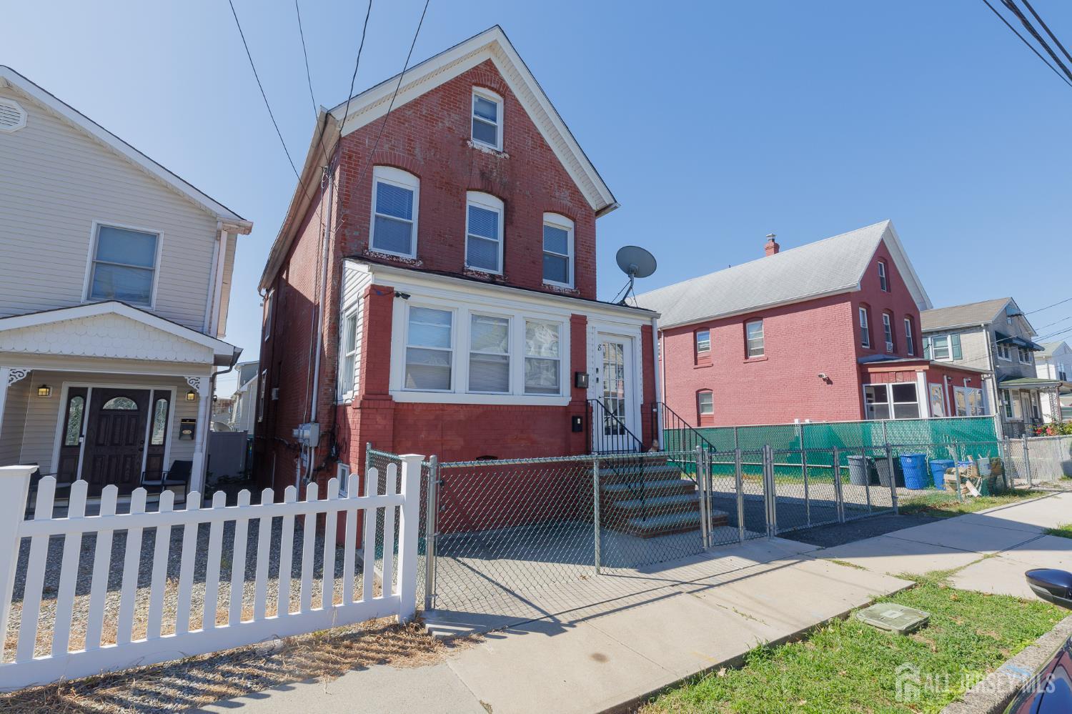 a front view of a house with a porch