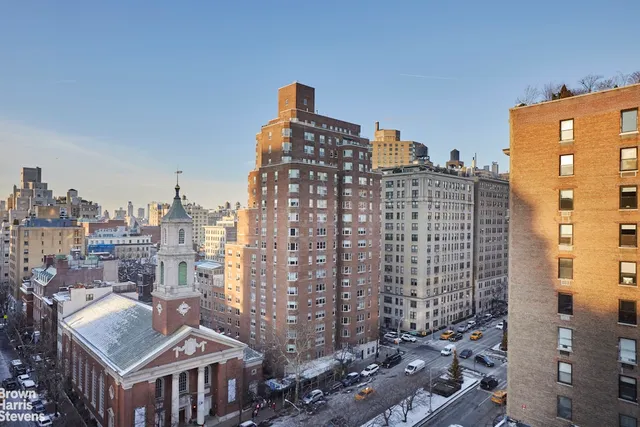 a front view of a building with glass windows