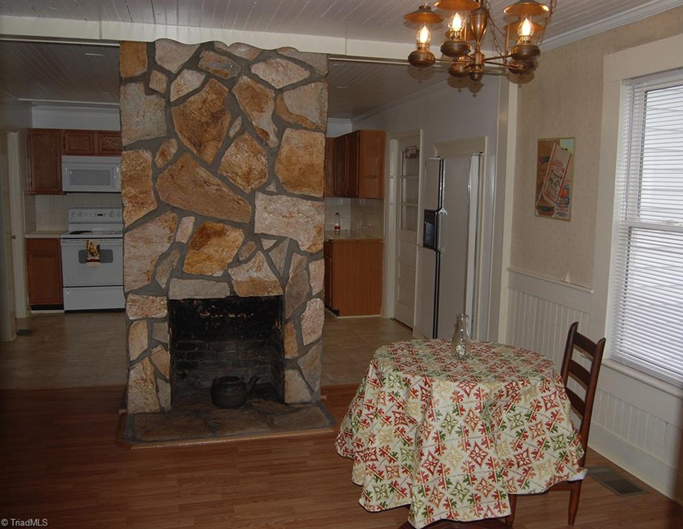 429 Hege Road Lexington, NC 27295 - Photo 12 of 29 Large open dining area features working fireplace.
