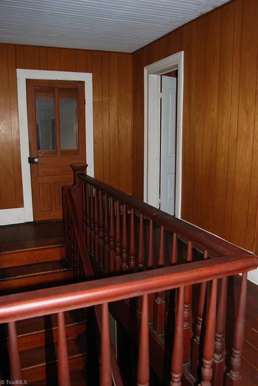 429 Hege Road Lexington, NC 27295 - Photo 20 of 29 Upstairs landing. Antique door opens to two unfinished rooms that can be used for storage or finished for bedroom suite.