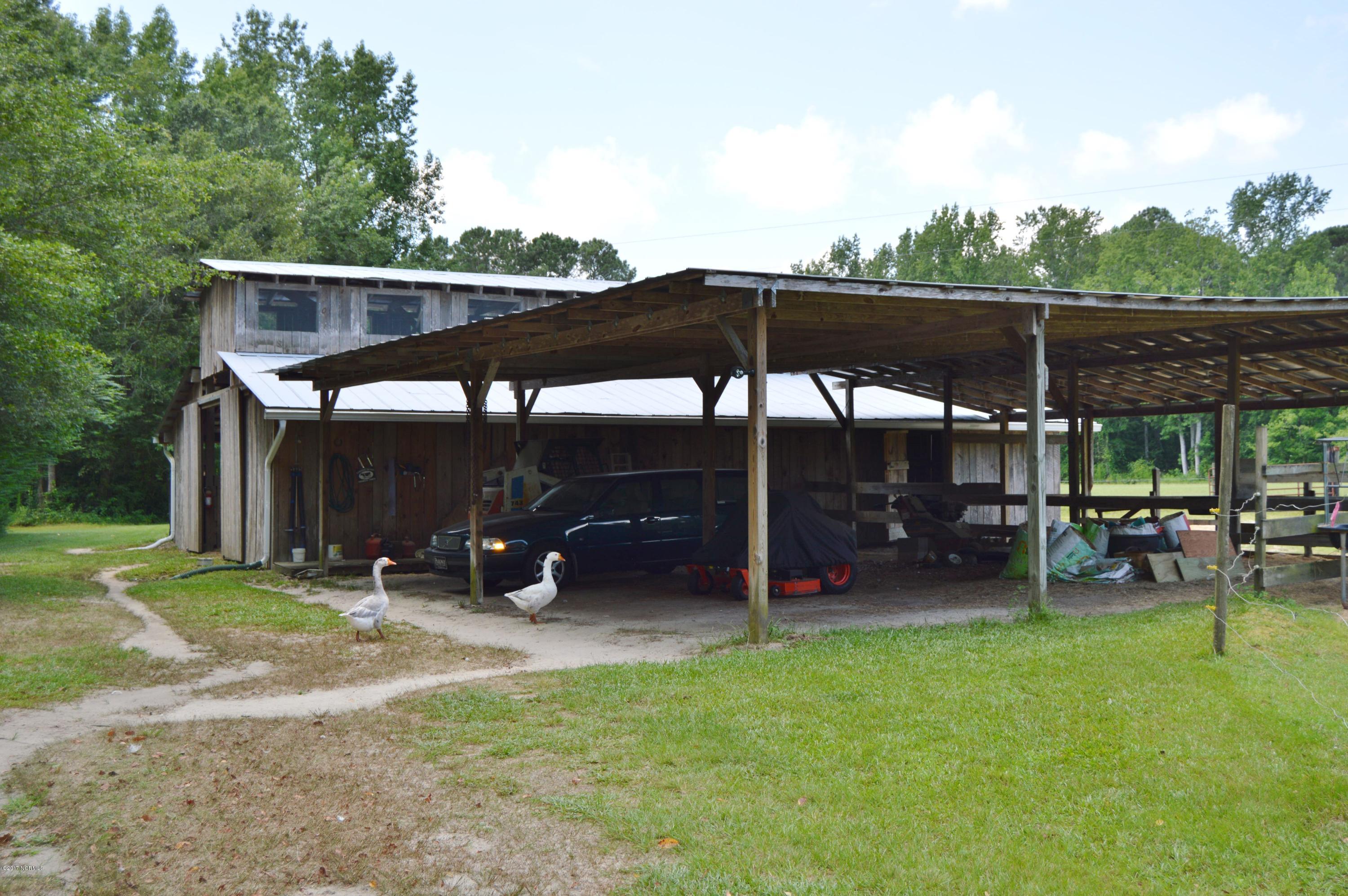 4694 Tuckahoe Road Ivanhoe, NC 28447 - Photo 14 of 62 outside stalls