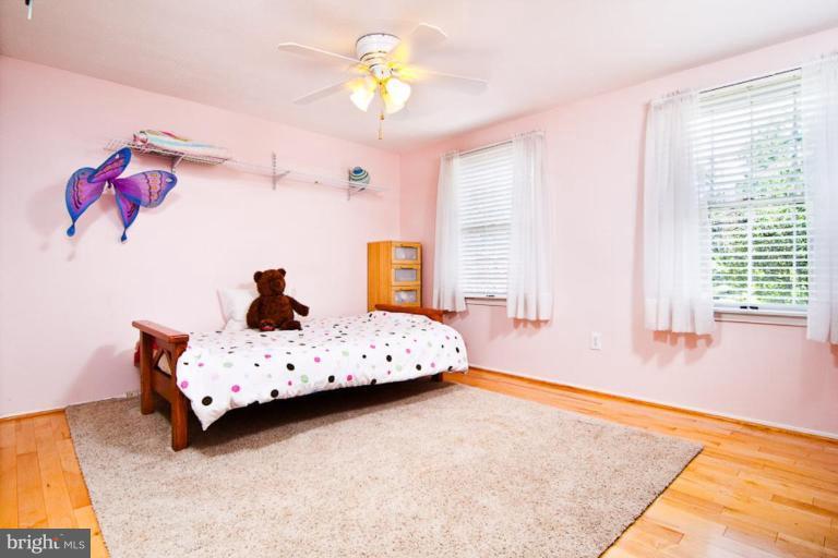 383 Yorkshire Lane Riva, MD 21140 - Photo 15 of 21 a bedroom with a bed dresser and window