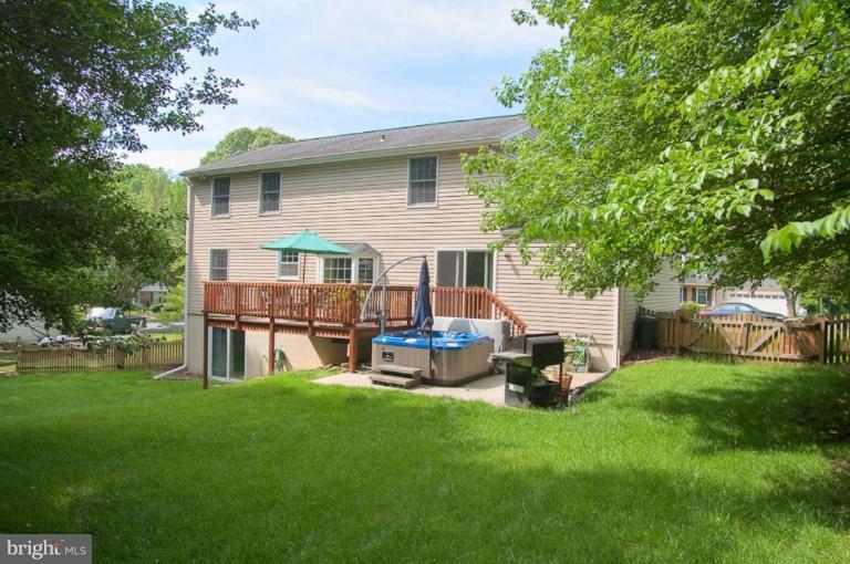 383 Yorkshire Lane Riva, MD 21140 - Photo 16 of 21 a house view with a sitting space and garden