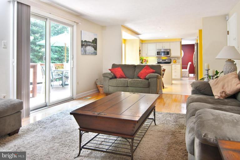 383 Yorkshire Lane Riva, MD 21140 - Photo 19 of 21 a living room with furniture and a large window