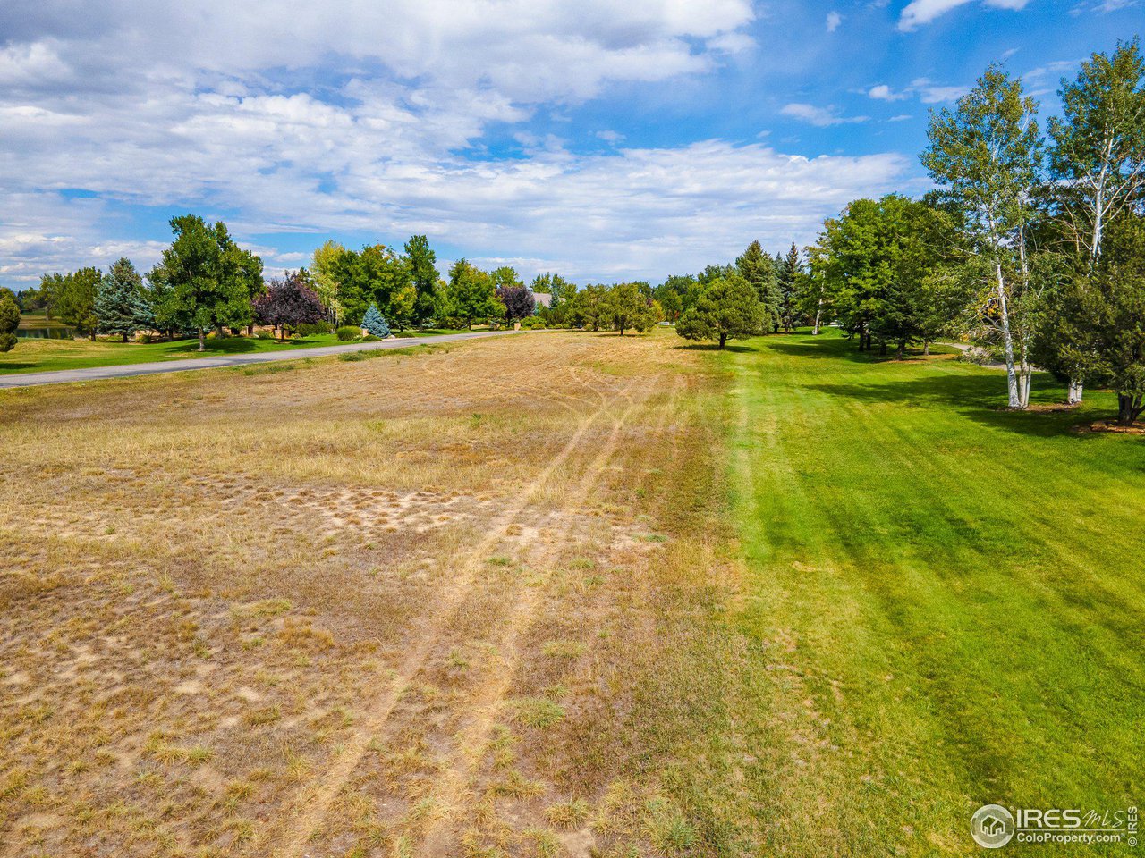 9432 Memory Lane Longmont, CO 80504 - Photo 17 of 22 a view of an outdoor space and swimming pool