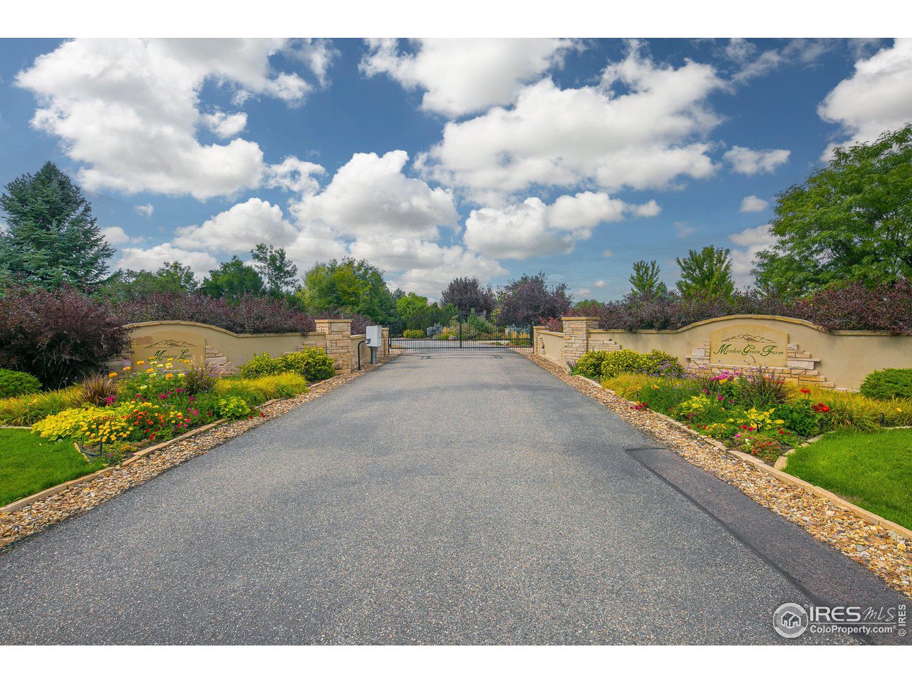 9432 Memory Lane Longmont, CO 80504 - Photo 20 of 22 a view of a lake with a big yard