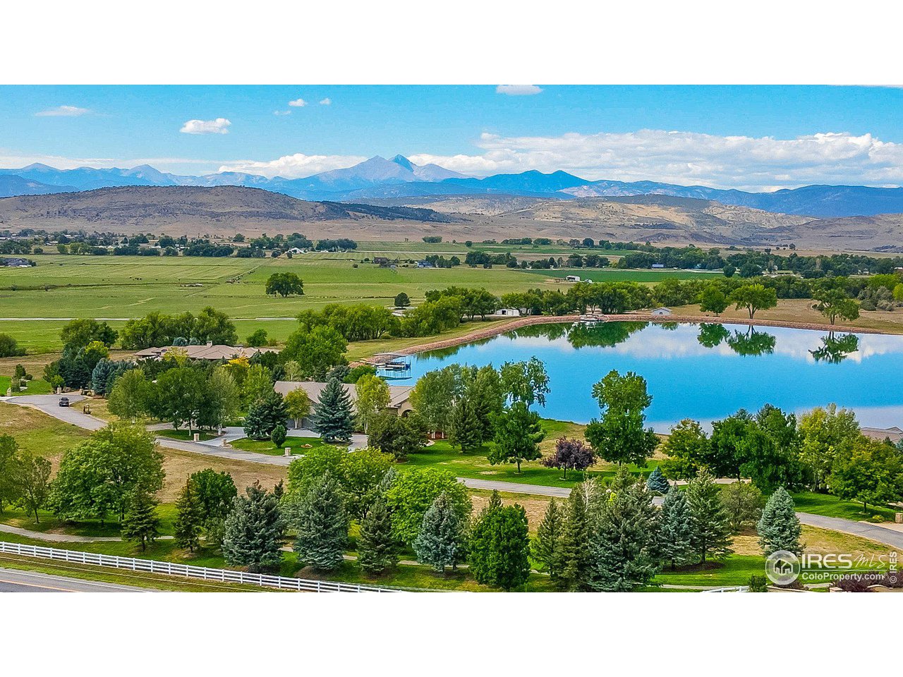 9432 Memory Lane Longmont, CO 80504 - Photo 2 of 22 a view of lake with mountain