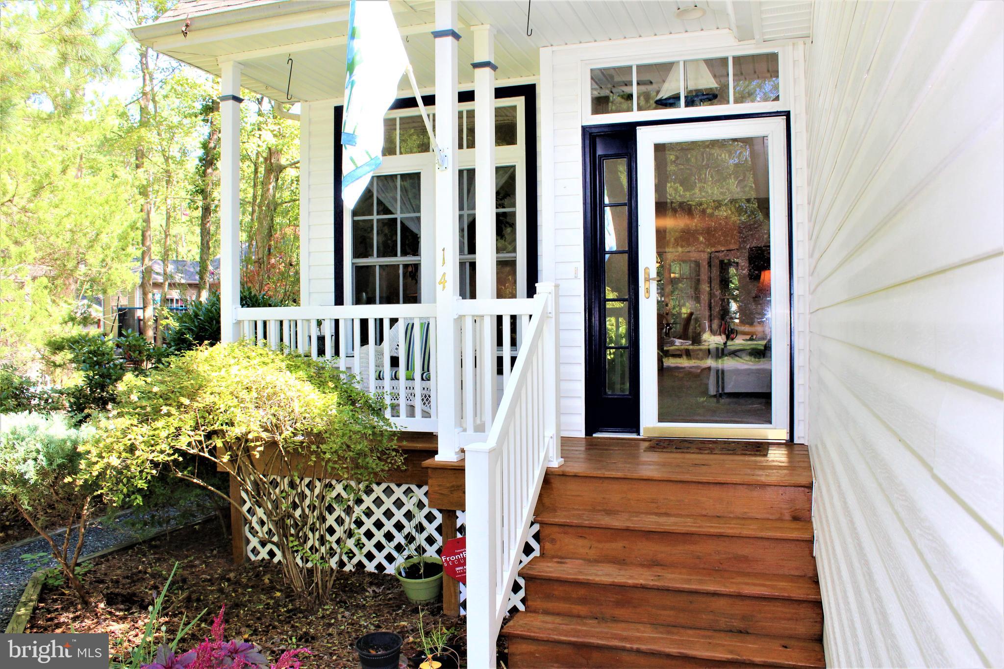 14 Gloucester Road Ocean Pines, MD 21811 - Photo 3 of 35 Front porch with sitting area