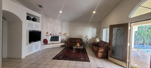 a room with painting and a table