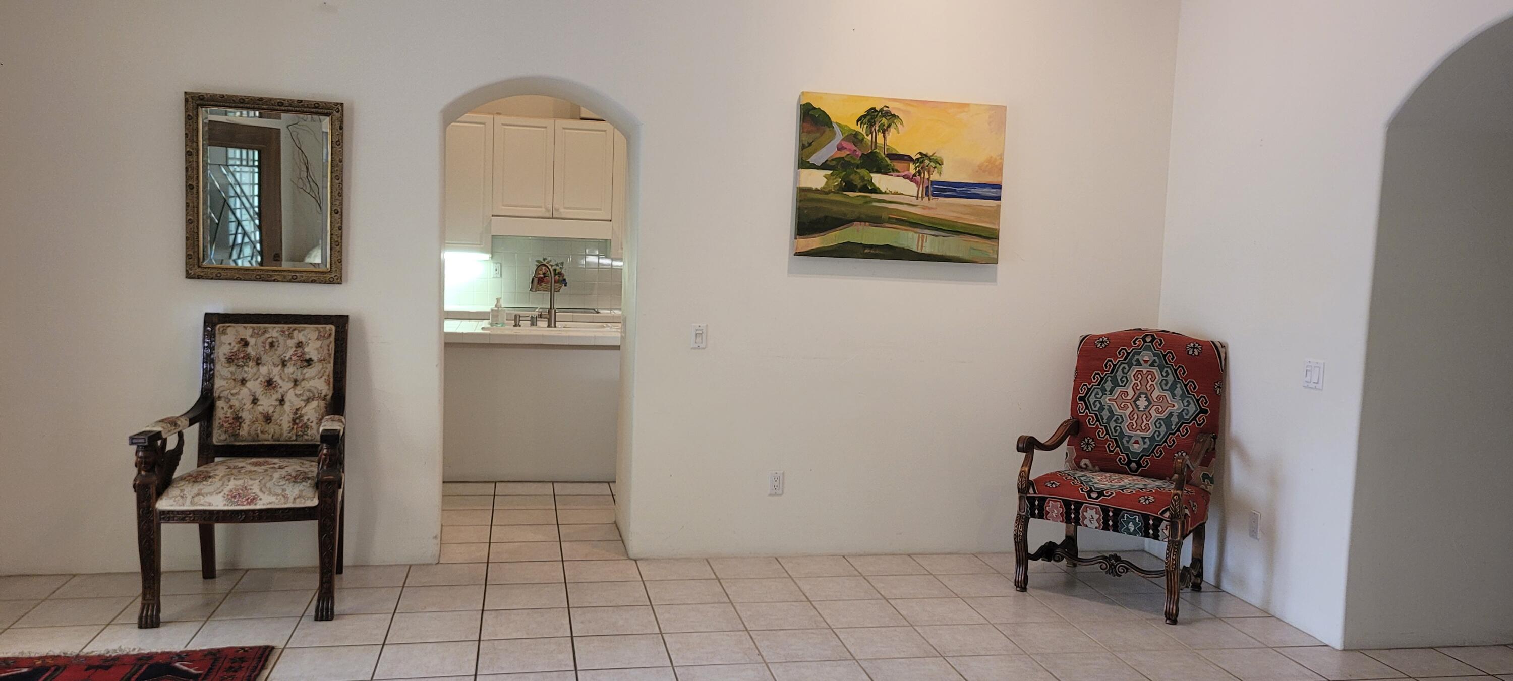 39914 Morningsprings Road Rancho Mirage, CA 92270 - Photo 26 of 54 a room with painting and a table