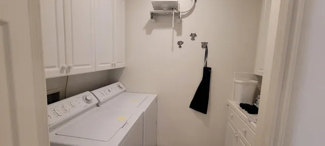 a view of a livingroom with furniture and front door