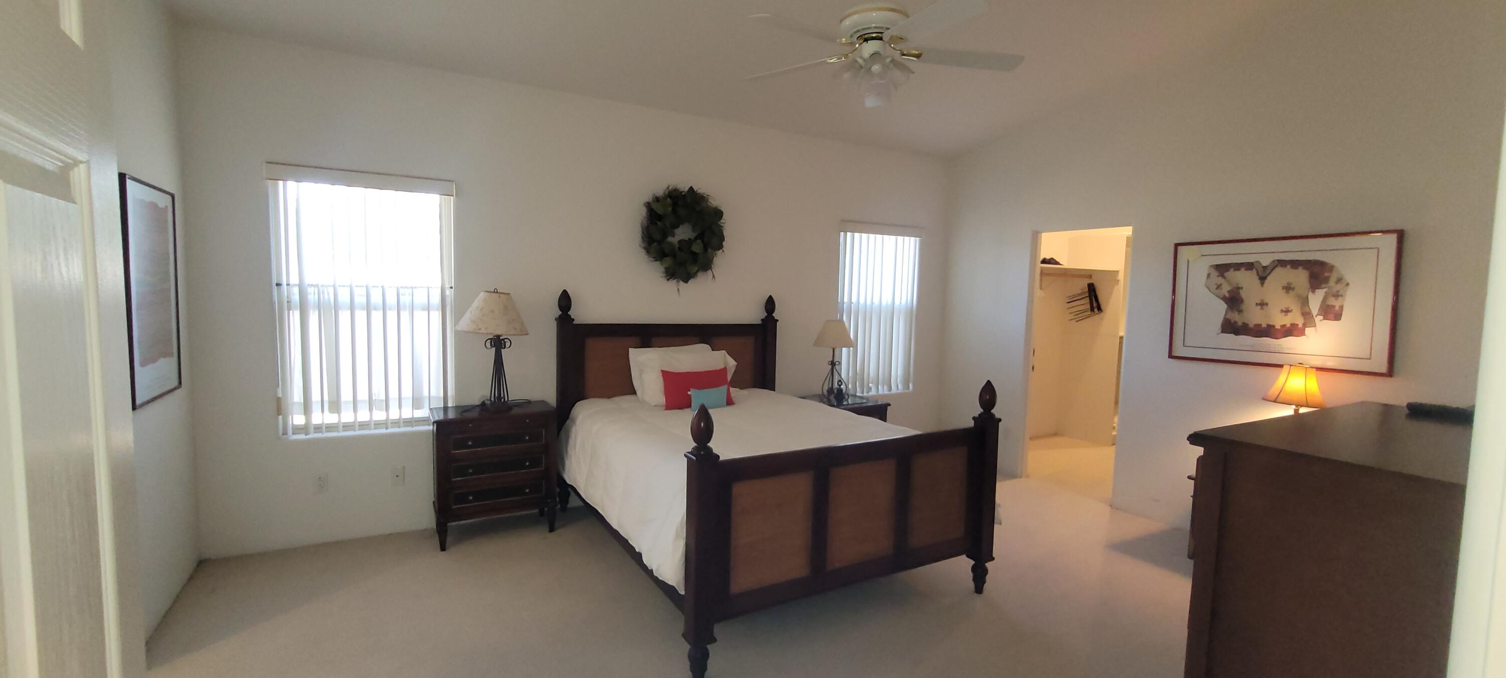 39914 Morningsprings Road Rancho Mirage, CA 92270 - Photo 37 of 54 a bedroom with a bed and a window