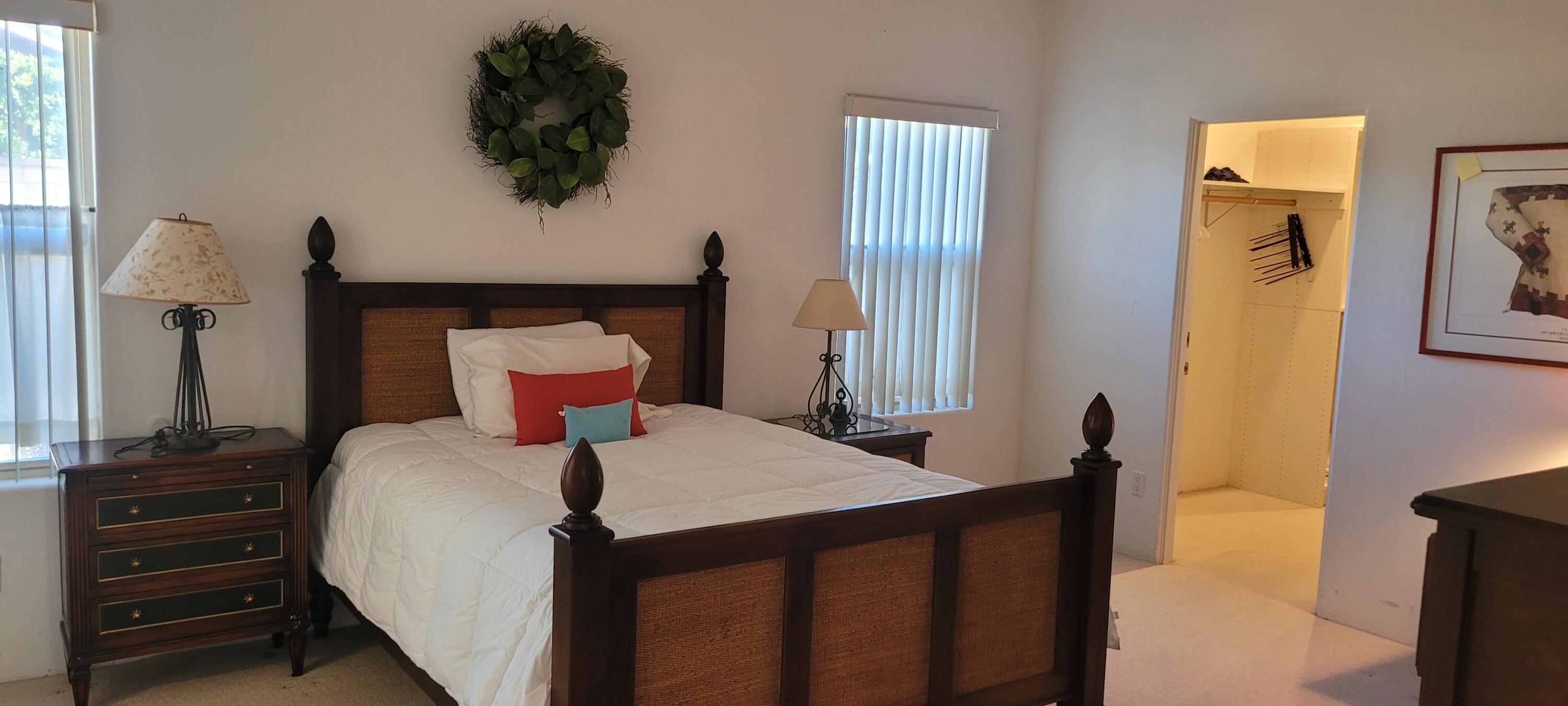 39914 Morningsprings Road Rancho Mirage, CA 92270 - Photo 38 of 54 a bedroom with a bed and a flat tv screen on dresser