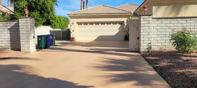 a front view of a house with a garage